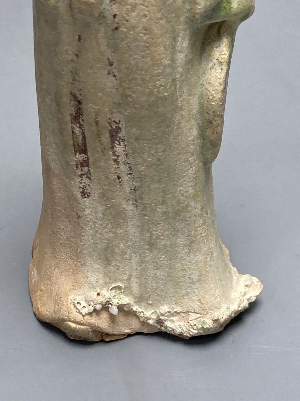 A Chinese part glazed pottery lady, Tang, height 20cm
